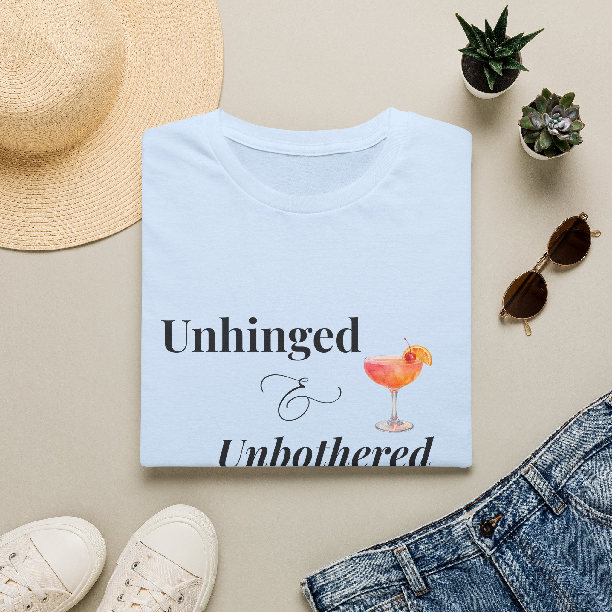 "Unhinged & Unbothered" Tee by Meno & Mimosas